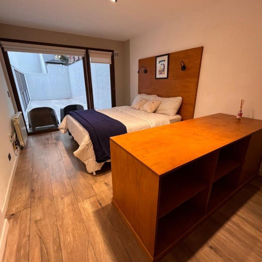 Exclusivo Departamento Monoambiente con Patio y Cochera – Edificio España Way
